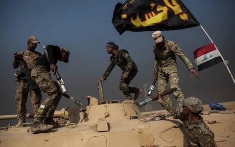 Binh sĩ Iraq chiến đấu với IS tại Mosul. Ảnh: WSJ