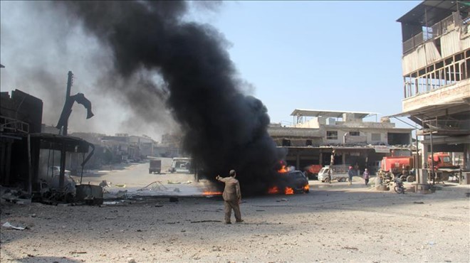 Hiện trường một vụ nổ ở một khu công nghiệp tại Idlib, Syria, ngày 14/8. ( Nguồn: Anadolu)